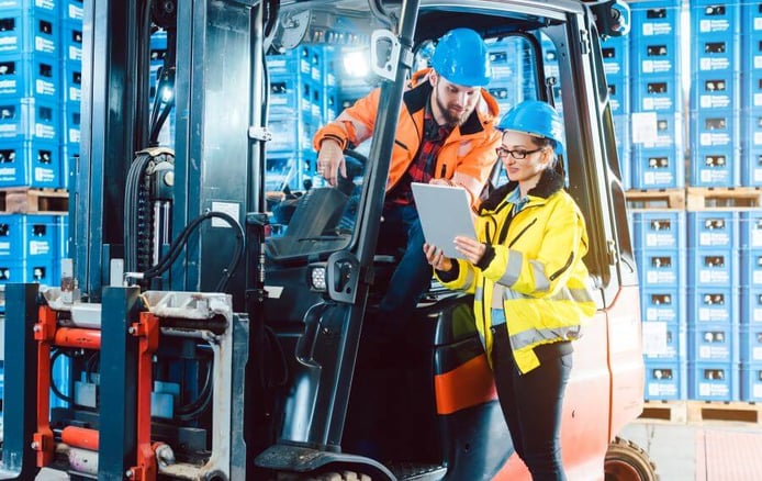 Workers in Columbus logistics warehouse checking the inventory