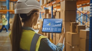 warehouse associate reviewing analytics